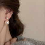 Two wearing pearl earrings, new hot style, high end unique earrings, women's light luxury temperament, atmospheric earrings