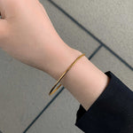 Plain gold ring bracelet for women light luxury niche, gold plated titanium steel, high end delicate design