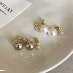 Two wearing pearl earrings, new hot style, high end unique earrings, women's light luxury temperament, atmospheric earrings