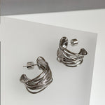 925 Sterling silver needles, these retro hollow metal C-ring hoop earrings showcase a high quality, edgy design with a unique