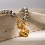 Silver Bead Bracelet with Gold Heart Pendant, Elegant and Minimalist Design