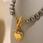 Silver Bead Bracelet with Gold Heart Pendant, Elegant and Minimalist Design