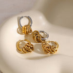 Elegant Earrings with A Color Blocked Design and Five, Six Small Gold Rings for A Sophisticated Touch