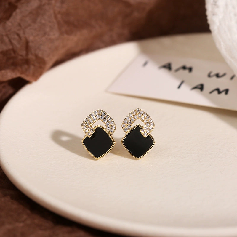 Stylish black stud earrings for women, 925 sterling silver, offering a touch of luxury & elegance, perfect for enhancing refined & sophisticated looks