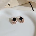 Elegant sterling silver black stud earrings for women high end French design, exuding a touch of foreign charm & light luxury