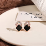 Stylish black stud earrings for women, 925 sterling silver, offering a touch of luxury & elegance, perfect for enhancing refined & sophisticated looks